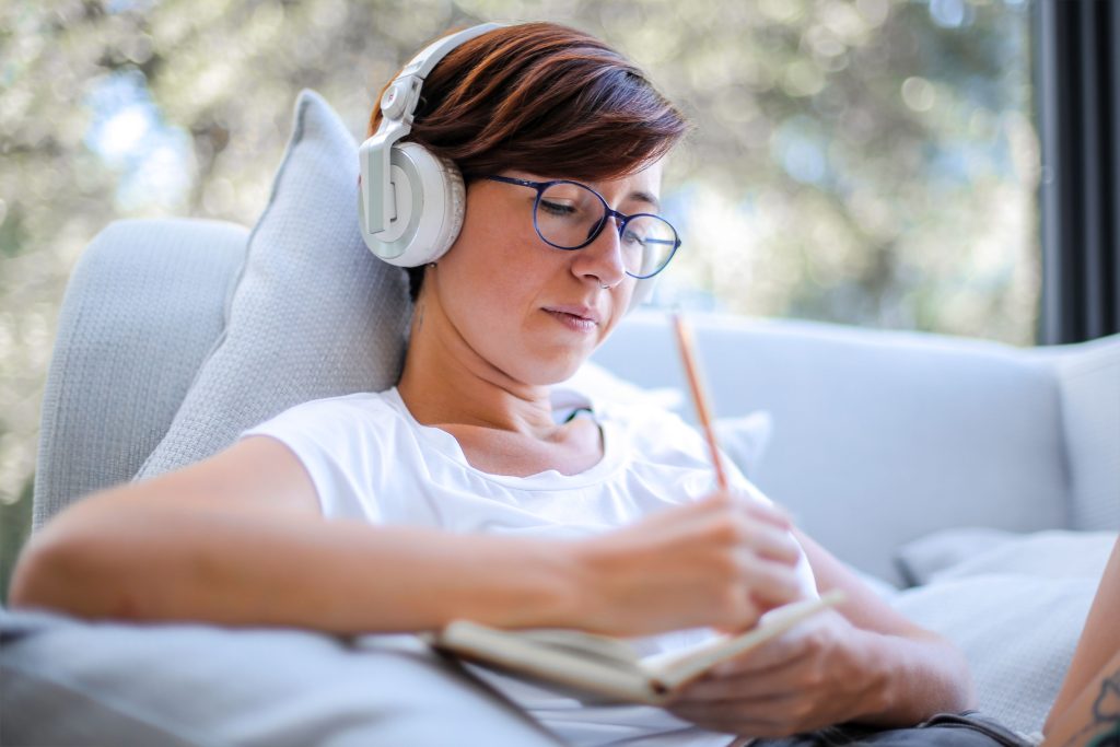 Person improving interpersonal and intrapersonal communication skills through reflection and active listening