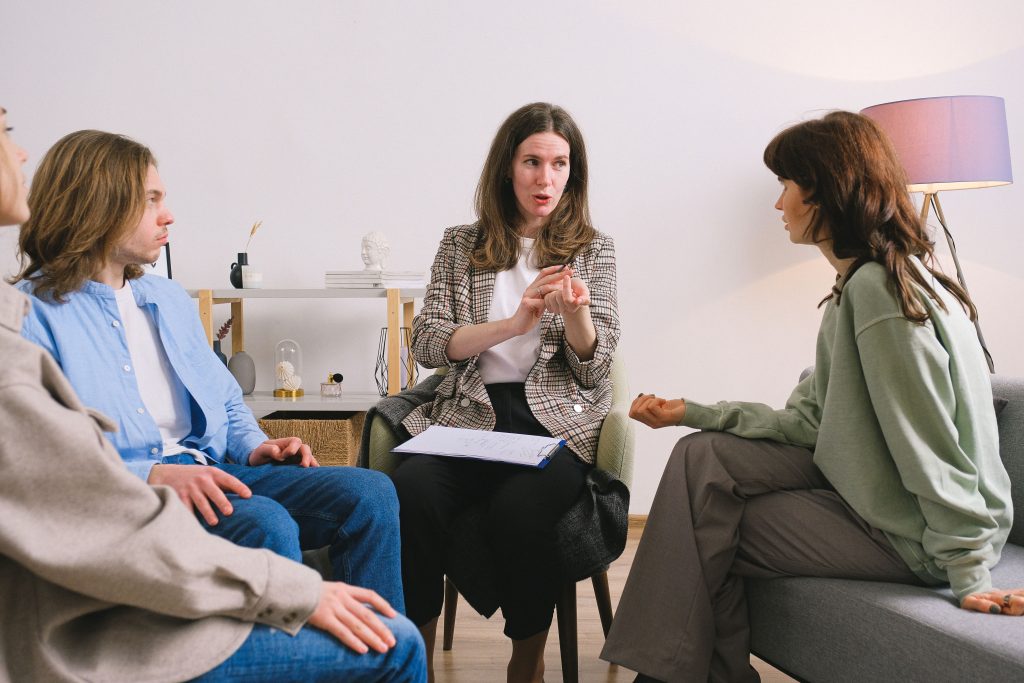 Person thinking while communicating with others, representing interpersonal and intrapersonal communication