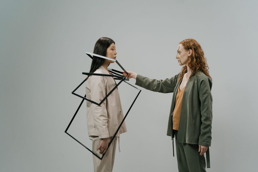 Person reflecting on thoughts and emotions as an example of intrapersonal communication